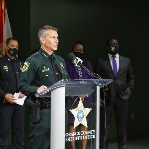 Sheriff Mina speaking at a press conference