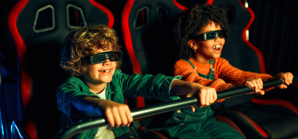 Kids on a theme park ride