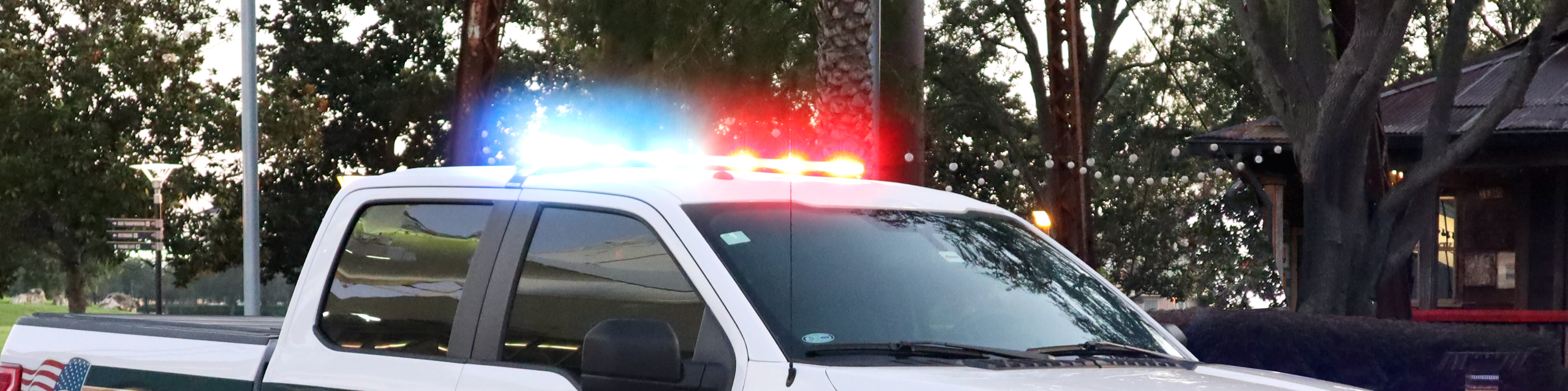 Flashing sirens of a deputy's truck